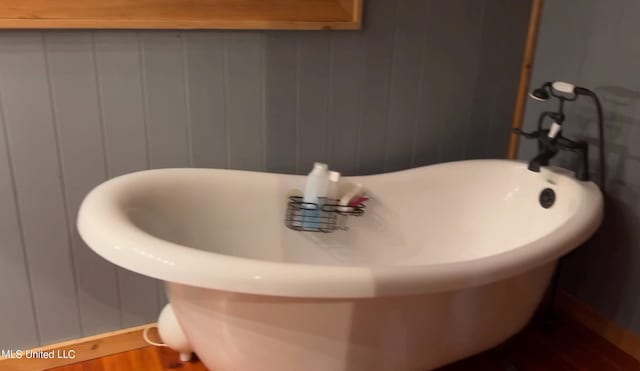 bathroom featuring wood-type flooring