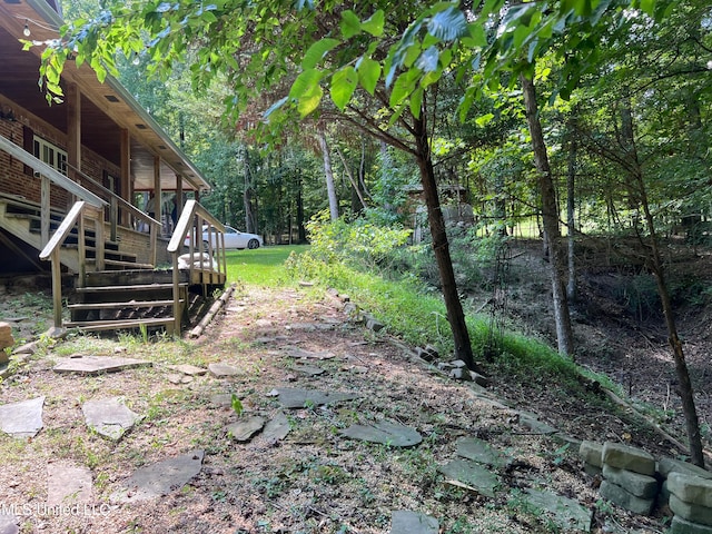 view of yard with a deck