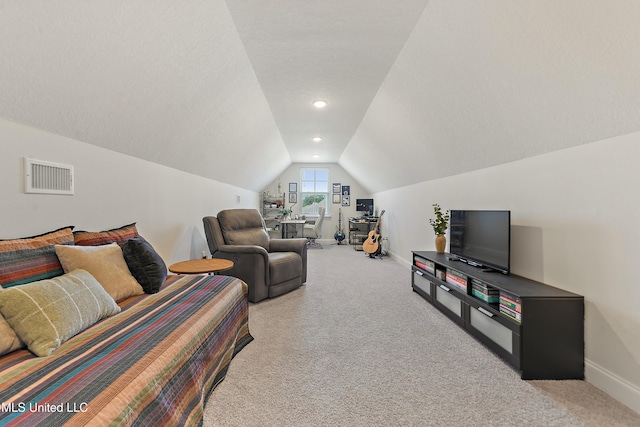 2918 Juliette Dr, Ocean Springs, MS 39564 - living area with lofted ceiling, carpet flooring, and baseboards