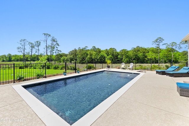 2918 Juliette Dr, Ocean Springs, MS 39564 - view of swimming pool featuring fence, a patio area, and view of wooded area