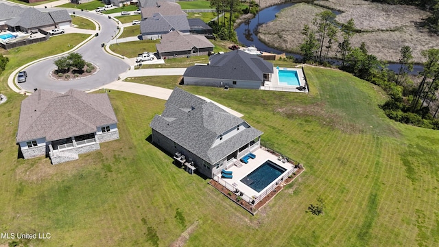 2918 Juliette Dr, Ocean Springs, MS 39564 - aerial view of residential area with a pool area and a large body of water