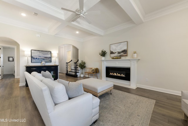 2918 Juliette Dr, Ocean Springs, MS 39564 - living room with arched walkways, beam ceiling, ceiling fan, recessed lighting, and dark wood-style floors