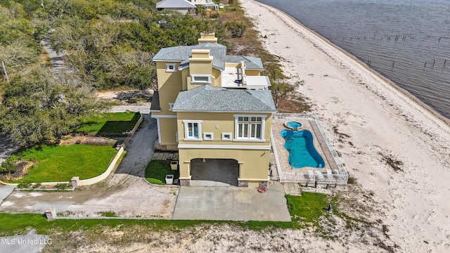 birds eye view of property featuring a water view