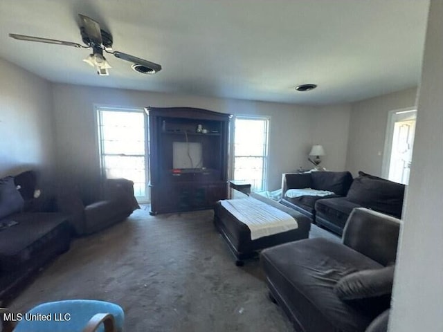 living room featuring ceiling fan