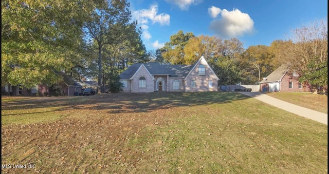 view of front of property with a front lawn