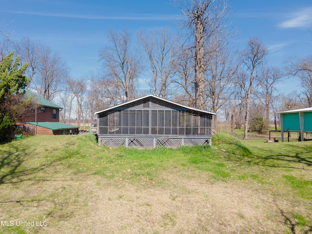 95 Nesting Site, Vicksburg, MS 39183 - back of property with a yard and a sunroom