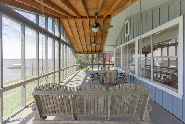 95 Nesting Site, Vicksburg, MS 39183 - unfurnished sunroom featuring vaulted ceiling, a ceiling fan, and a water view