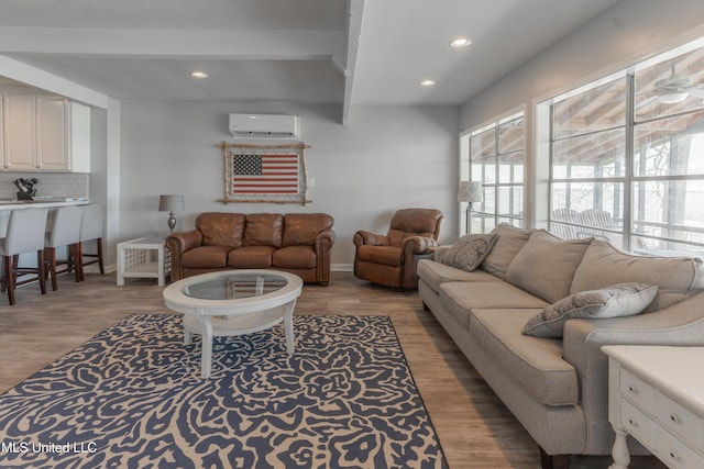 95 Nesting Site, Vicksburg, MS 39183 - living room with recessed lighting, a wall mounted AC, baseboards, and wood finished floors