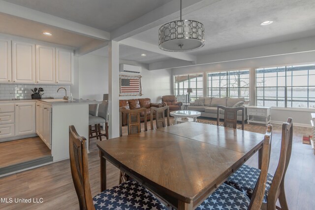 95 Nesting Site, Vicksburg, MS 39183 - dining room with beam ceiling, recessed lighting, a wall mounted air conditioner, and wood finished floors