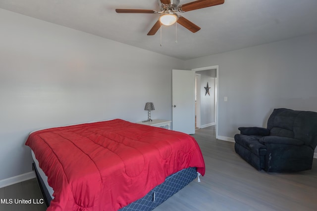 95 Nesting Site, Vicksburg, MS 39183 - bedroom featuring baseboards, wood finished floors, and a ceiling fan