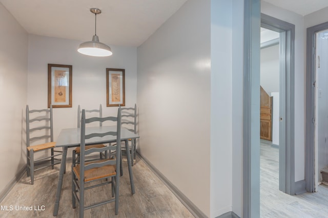 95 Nesting Site, Vicksburg, MS 39183 - dining room with light wood-style flooring and baseboards