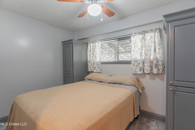 95 Nesting Site, Vicksburg, MS 39183 - bedroom with baseboards, wood finished floors, and a ceiling fan