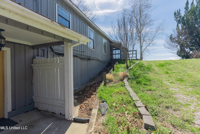 95 Nesting Site, Vicksburg, MS 39183 - view of home's exterior featuring a lawn and board and batten siding
