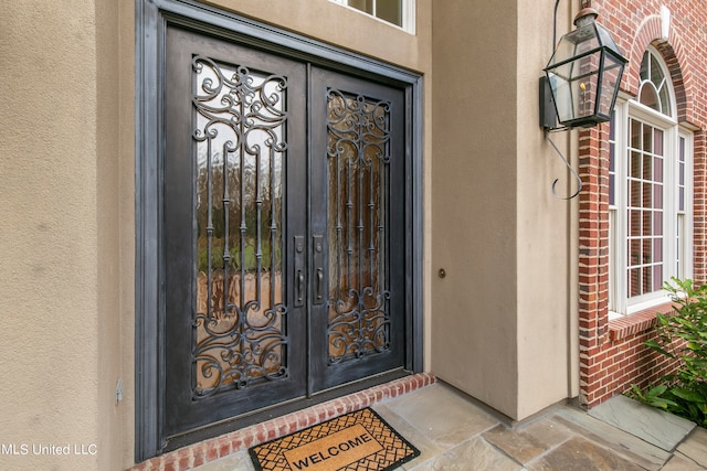 view of exterior entry with french doors