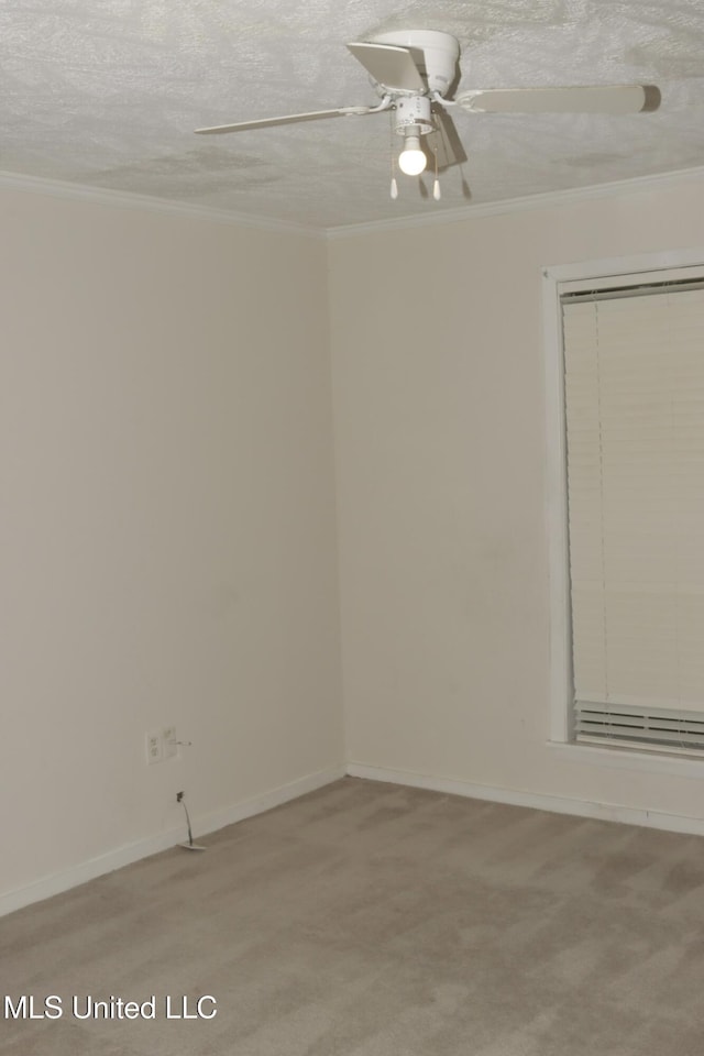 219 Lake Cove Dr, Jackson, MS 39212 - empty room featuring light colored carpet, ceiling fan, crown molding, and a textured ceiling