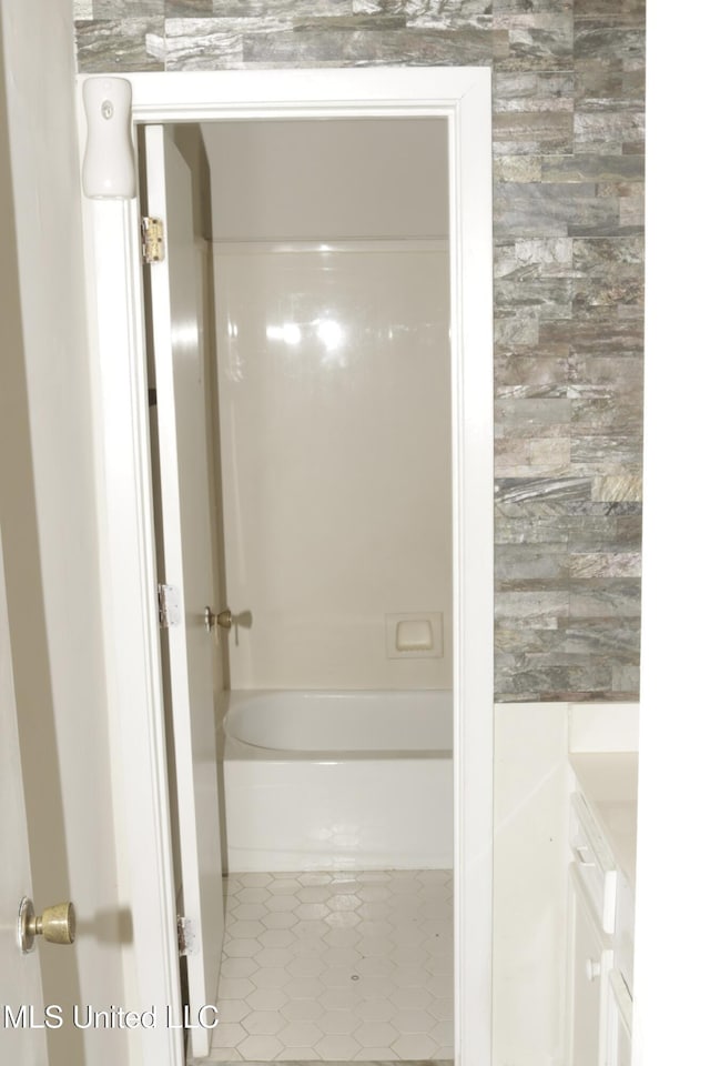 219 Lake Cove Dr, Jackson, MS 39212 - full bath with tile patterned floors and shower / tub combination