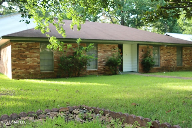 219 Lake Cove Dr, Jackson, MS 39212 - ranch-style house with a front lawn and brick siding