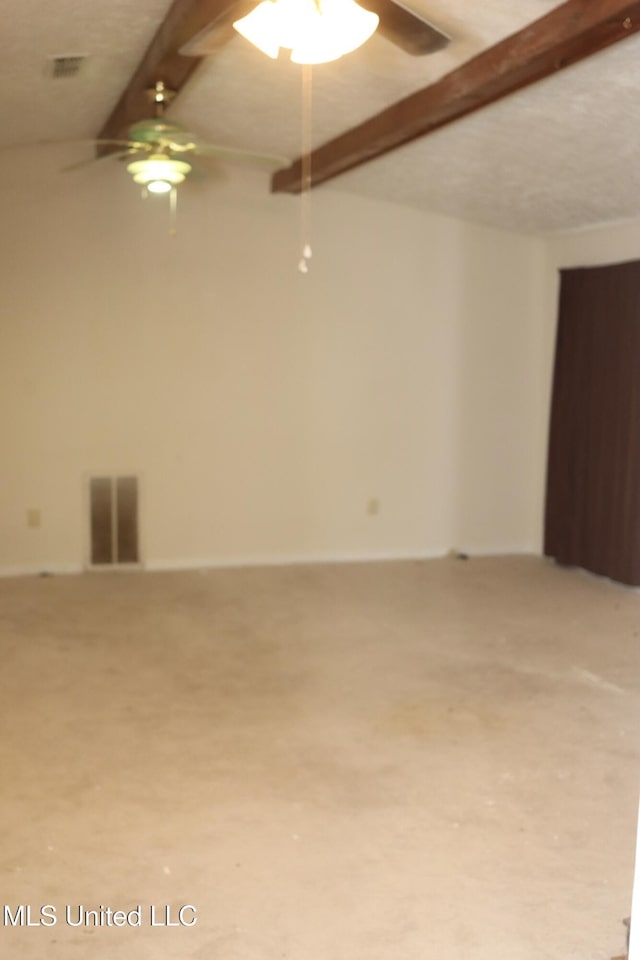 219 Lake Cove Dr, Jackson, MS 39212 - carpeted empty room with ceiling fan and beam ceiling