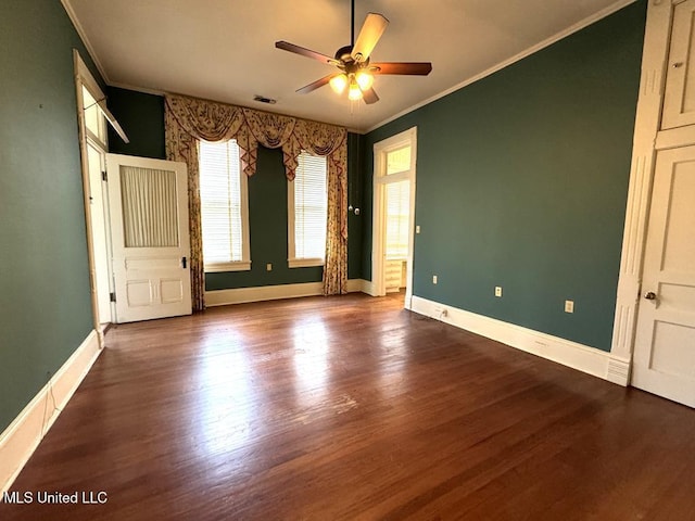 unfurnished bedroom featuring hardwood / wood-style flooring, ceiling fan, and ornamental molding