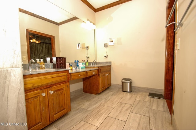 bathroom featuring vanity and ornamental molding