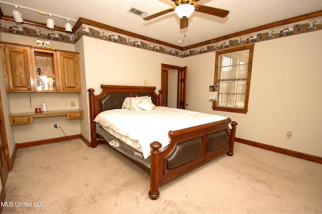 bedroom featuring light carpet and ceiling fan