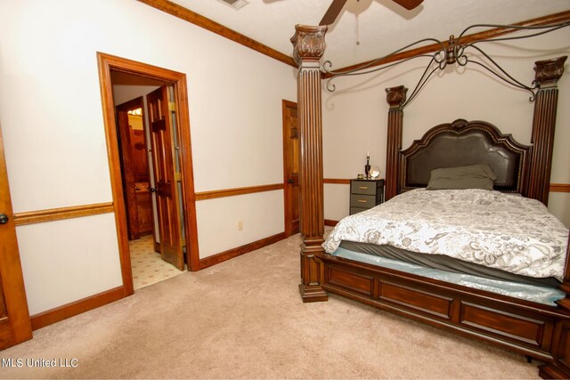 carpeted bedroom with crown molding and ceiling fan