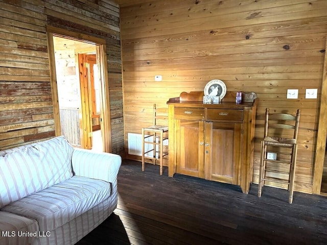 12 N Oak St, Vidalia, LA 71373 - living area featuring dark hardwood / wood-style flooring and wooden walls