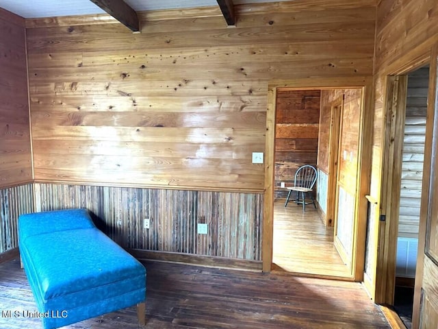 12 N Oak St, Vidalia, LA 71373 - unfurnished room featuring beam ceiling, wood walls, and hardwood / wood-style floors
