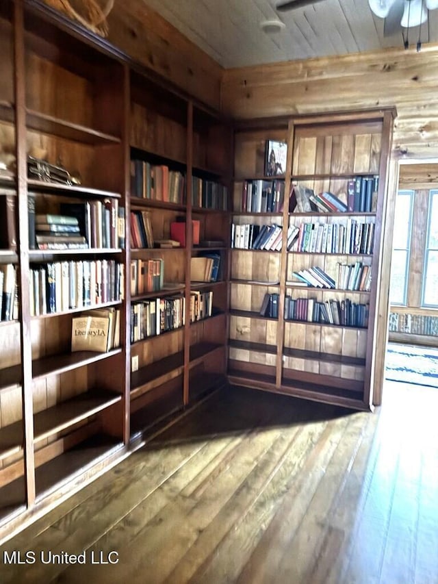 12 N Oak St, Vidalia, LA 71373 - sitting room featuring hardwood / wood-style floors and wooden walls