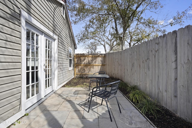 view of patio featuring french doors