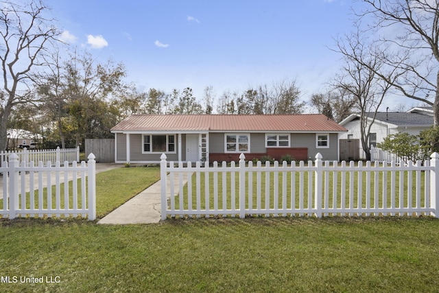 ranch-style home featuring a front lawn