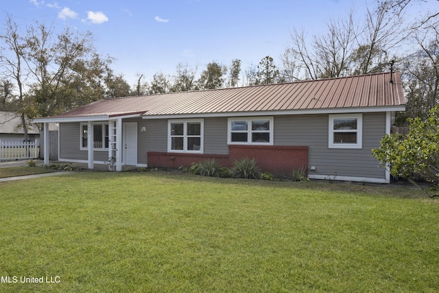 ranch-style home with a porch and a front yard