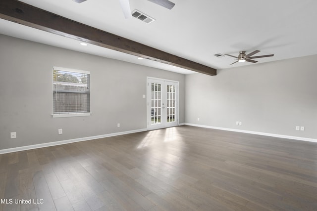 empty room with ceiling fan, dark hardwood / wood-style flooring, french doors, and beamed ceiling