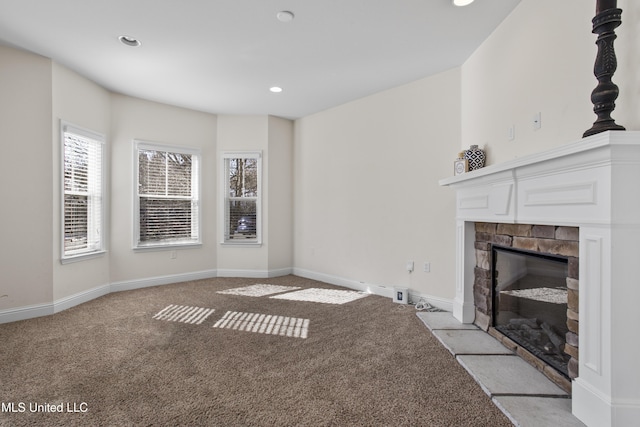 unfurnished living room with light colored carpet