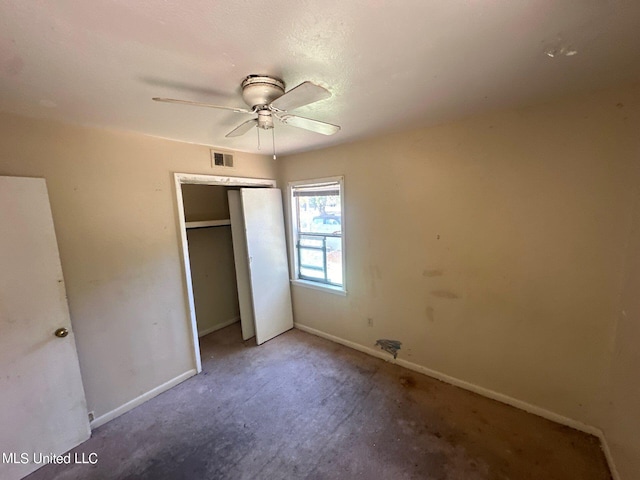 unfurnished bedroom featuring a closet and ceiling fan