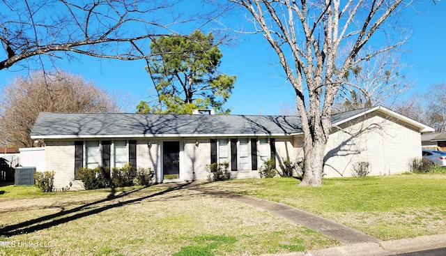 ranch-style home featuring a front yard