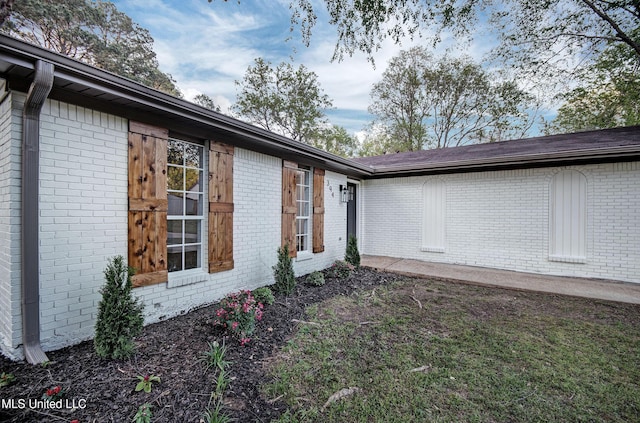 394 Woodcliff Dr, Jackson, MS 39212 - view of home's exterior featuring brick siding