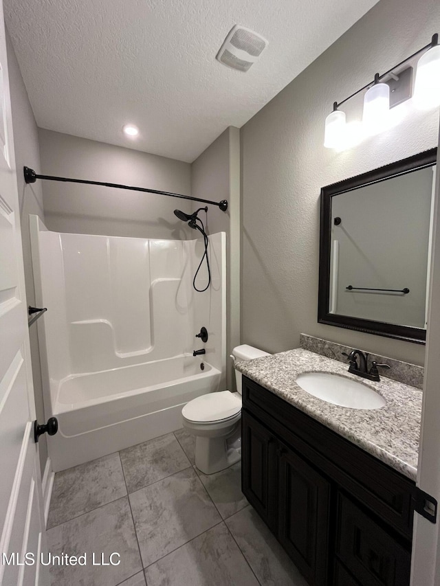 full bath with shower / washtub combination, visible vents, toilet, a textured ceiling, and vanity