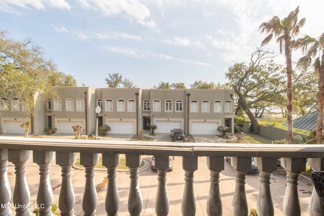 exterior space featuring fence and stucco siding