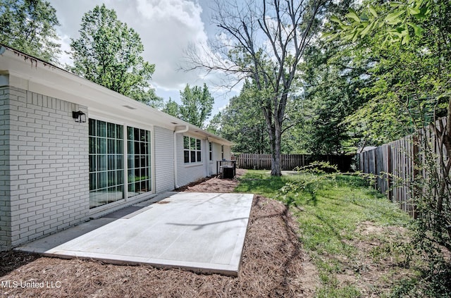 1201 Manchester Dr, Clinton, MS 39056 - view of yard with a fenced backyard, cooling unit, and a patio area