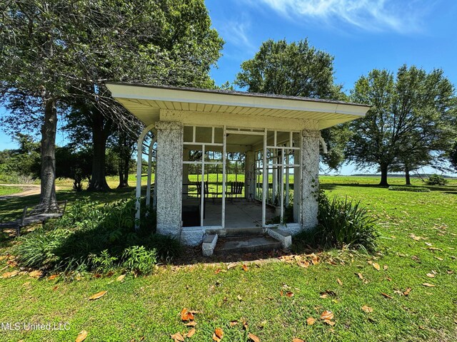 5010 Old Hwy 49, Clarksdale, MS 38614 - view of outdoor structure featuring a sunroom