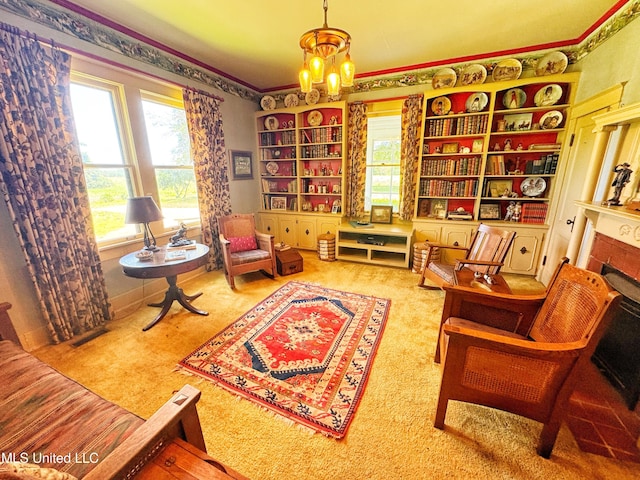 5010 Old Hwy 49, Clarksdale, MS 38614 - living area featuring healthy amount of natural light, a chandelier, ornamental molding, and carpet flooring