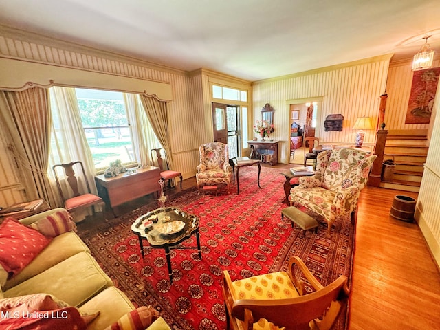 5010 Old Hwy 49, Clarksdale, MS 38614 - living area featuring wood finished floors, ornamental molding, and wallpapered walls