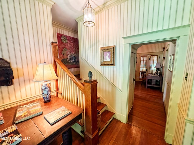 5010 Old Hwy 49, Clarksdale, MS 38614 - stairs with hardwood / wood-style flooring, crown molding, a decorative wall, and a chandelier
