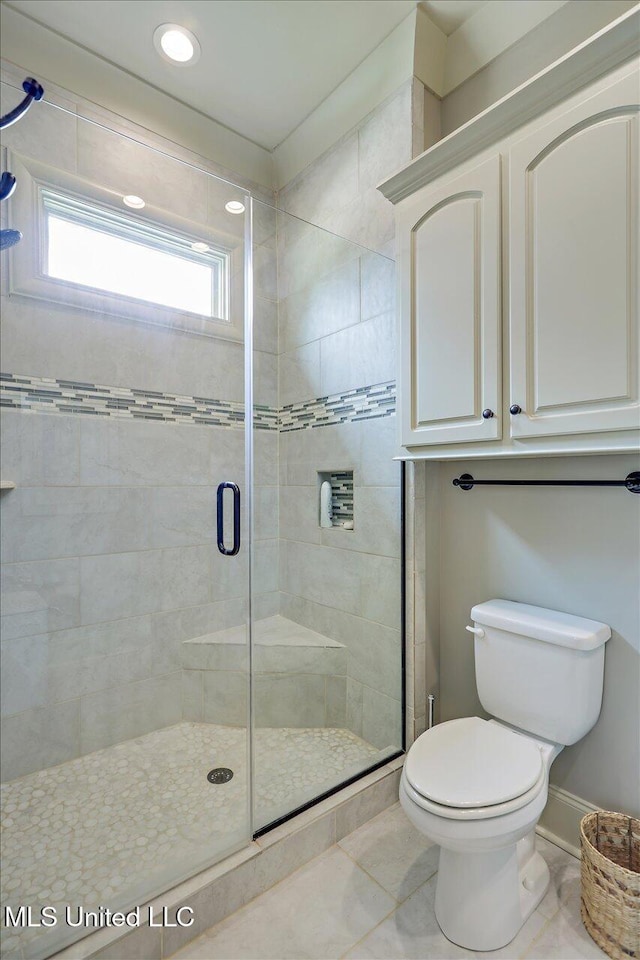181 Ironwood Plantation Blvd, Madison, MS 39110 - full bathroom featuring toilet, a stall shower, tile patterned floors, recessed lighting, and baseboards