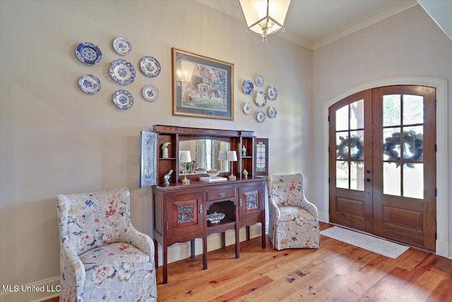 181 Ironwood Plantation Blvd, Madison, MS 39110 - entrance foyer with french doors, wood finished floors, arched walkways, baseboards, and crown molding