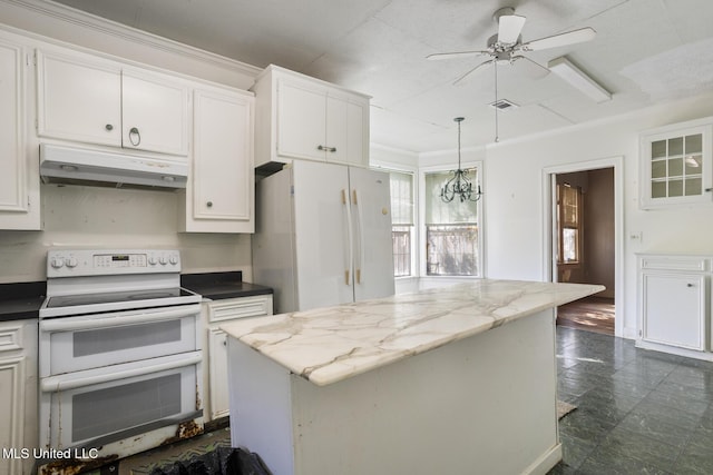 kitchen featuring under cabinet range hood, white cabinets, and white appliances