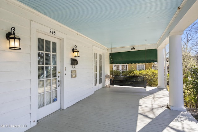 wooden deck with a porch