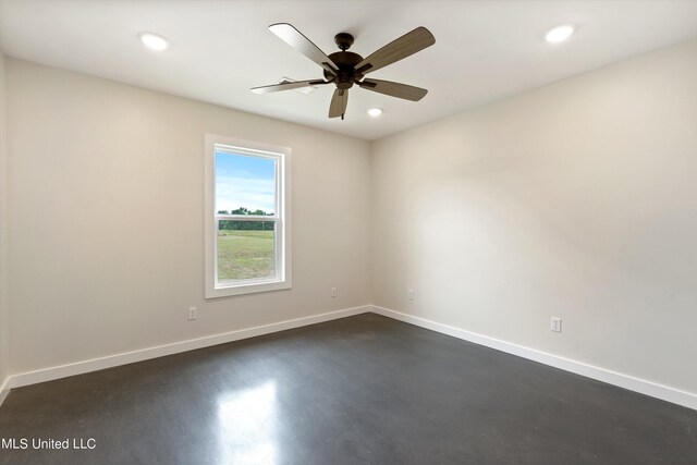 unfurnished room with ceiling fan