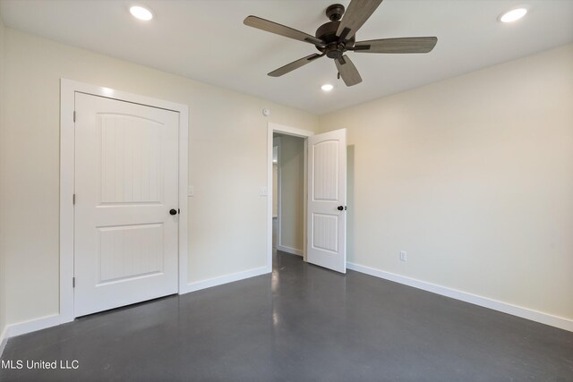 unfurnished bedroom with a closet and ceiling fan